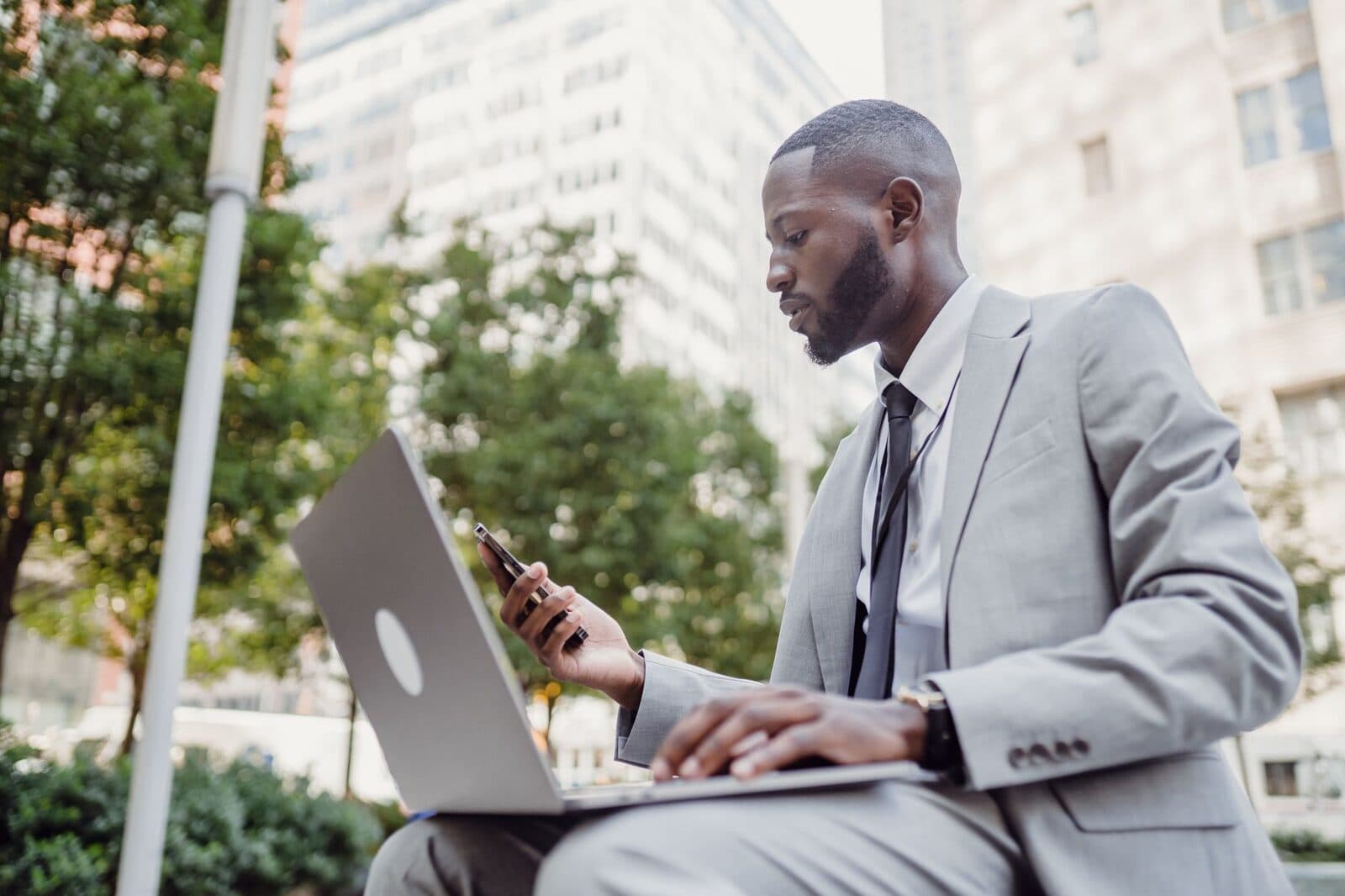Professional reviewing their online profile on a phone